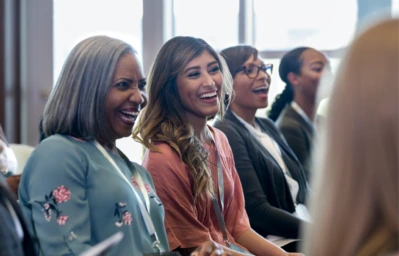 Women laughing in audience