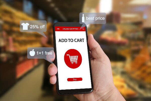 Concept of e-commerce online shopping marketing at supermarket